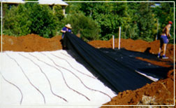 Trine Solution construction of a sand filter for a private residence waste water management system